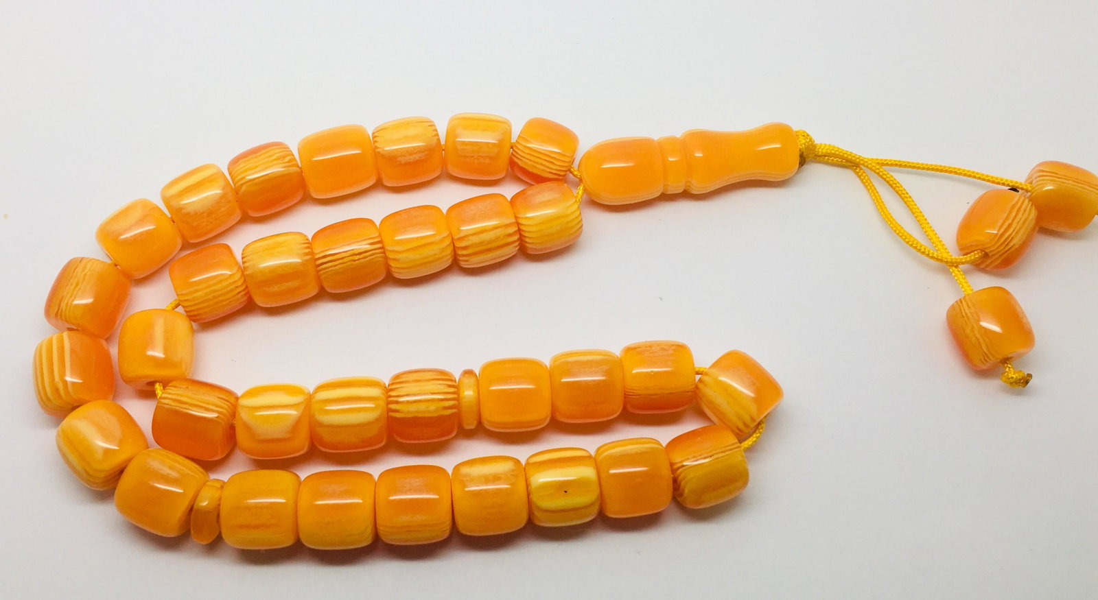 Unique and Impressive Bakelite Tesbih made from Barrel: Title: Unique and Impressive Bakelite Tesbih made from Barrel shaped Bakelite beads Metal: None Gemstones: Bakelite Weight: 57.60 g Size: Bead size: 11.94 x 12.21 mm Bead size: 0.47 x 0.481 inches Mad