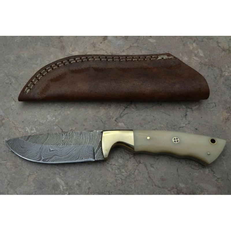 Combat damascus steel knife bowie fossil bone: Knife "Wells" Damascus knives are very durable, look great and keep sharpness perfectly. Damascus steel has high quality contents to give it an excellent edge and sharp cutting ability. The blade reta