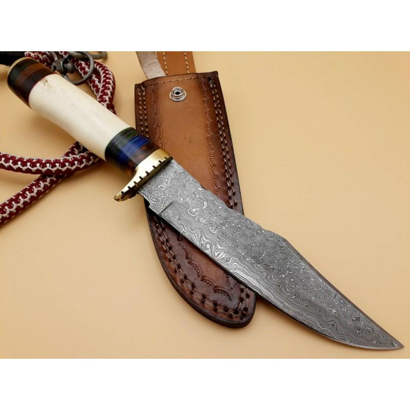 Bowie damascus steel knife camping bone leather sheath: Knife "Lawrence" made of damask steel. Handle –bone and scabbard - genuine leather. Damascus knives are very durable, look great and keep sharpness perfectly. Damascus steel has high quality content