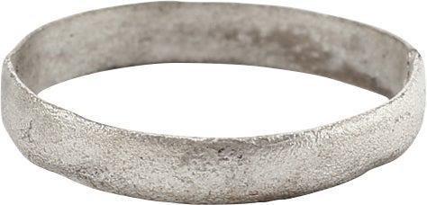 ANCIENT VIKING WEDDING RING, SIZE 5 1/4: Late 9th-early 11th century AD. Silvered bronze, size 5 1/4 for the small finger as was the custom. Narrowband, 2.7mm. Textured from burial and professionally refurbished with the pure silver overlay