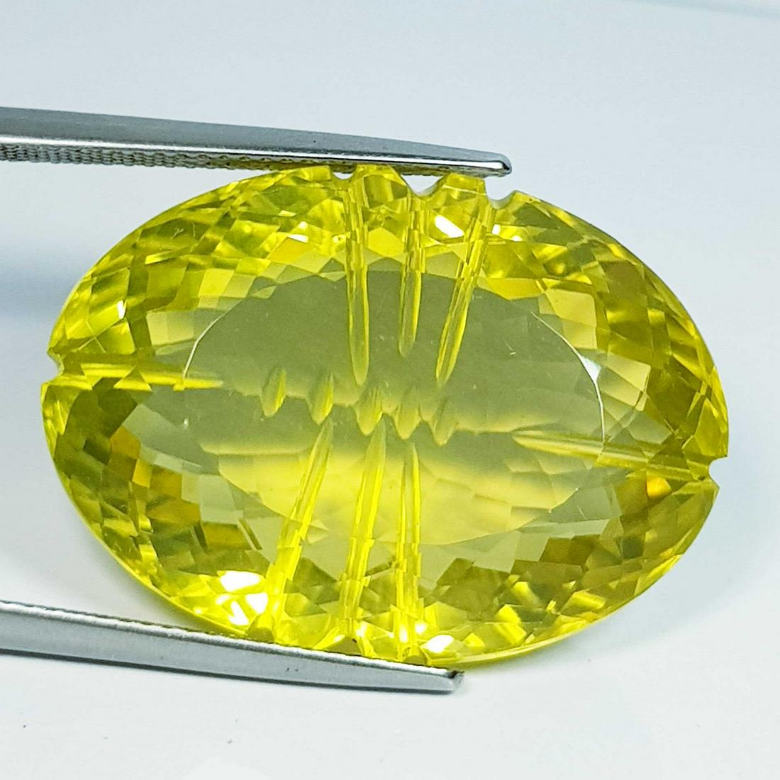 47.53 ct Natural Lemon Quartz Oval Flower Cut: No Reserve! Title: 47.53 ct Natural Lemon Quartz Oval Flower Cut Color/Clarity: VVS Gemstones: Loosegemstone Carat Weights: 47.53 Size/Dimensions: 28.15 x 20.35 x 13.00 Additional Information: Oval / 