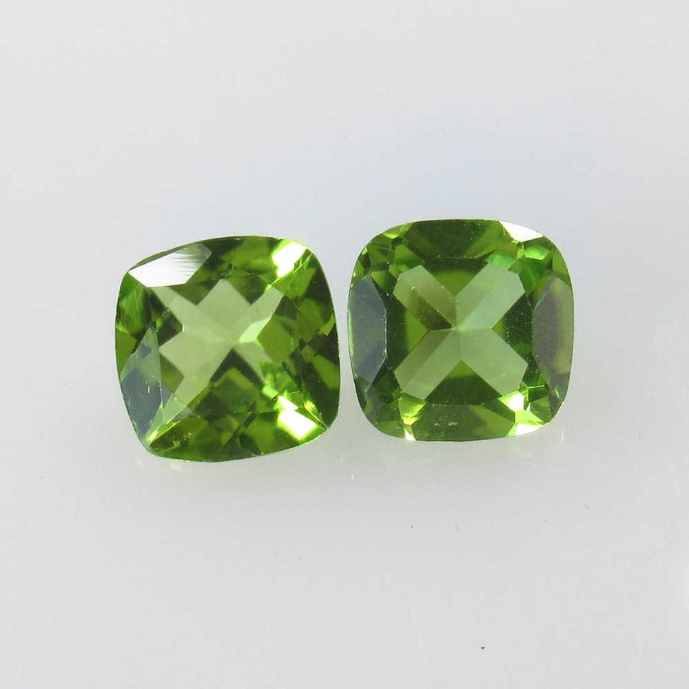 2.95 Ctw Natural Pakistan Peridot Cushion Pair: No Reserve! Title: 2.95 Ctw Natural Pakistan Peridot Cushion Pair Stone Clarity: VVS Gemstones: Peridot Size/Dimensions: 2.95 Carat Weights: 7.10 x 7.00 x 4.20 mm / 2 PC's Additional Information: Top 