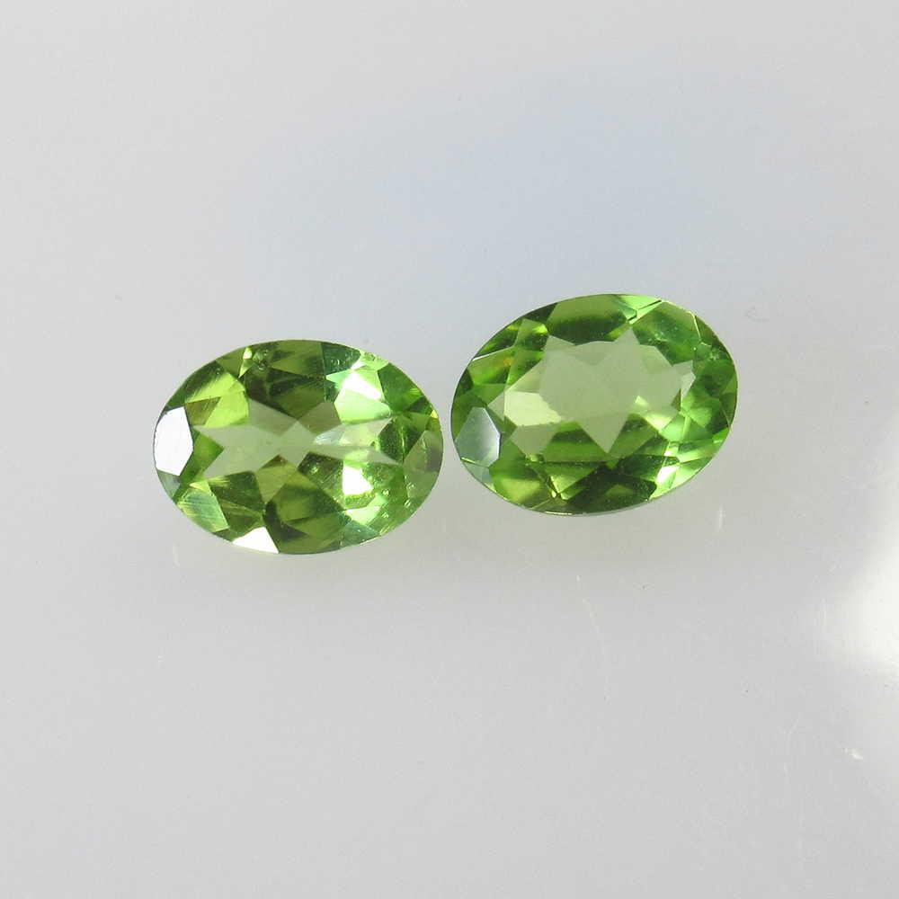 2.40 Ctw Natural Pakistan Peridot Oval Pair: No Reserve! Title: 2.40 Ctw Natural Pakistan Peridot Oval Pair Stone Clarity: VVS Gemstones: Peridot Size/Dimensions: 2.4 Carat Weights: 7.90 x 6.10 x 3.60 mm / 2 PC's Additional Information: Top Clas
