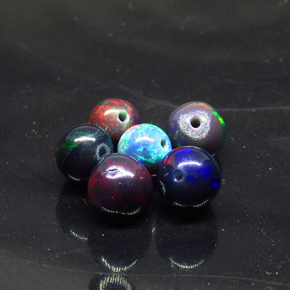 5.18 Ctw Natural 6 Drilled Black Opal Ball Beads: No Reserve! Title: 5.18 Ctw Natural 6 Drilled Black Opal Ball Beads Stone Clarity: Translucent Gemstones: Black Opal Beads Size/Dimensions: 5.18 Carat Weights: 5.30 to 6.10 mm / 6 PC's Additional Info