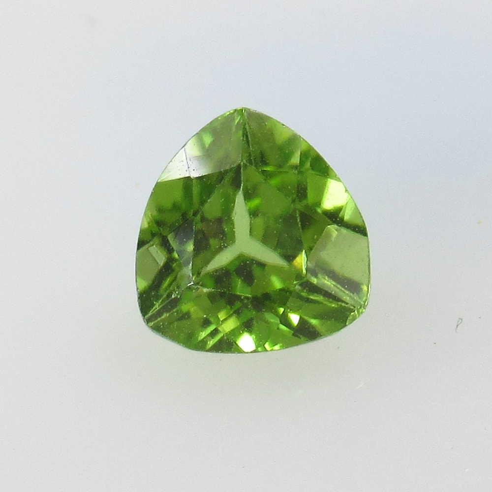 1.41 Ctw Natural Pakistan Peridot Trillion Cut: No Reserve! Title: 1.41 Ctw Natural Pakistan Peridot Trillion Cut Stone Clarity: VVS Gemstones: Peridot Size/Dimensions: 1.41 Carat Weights: 7.10 x 7.00 x 6.00 mm Additional Information: Top Class Lus