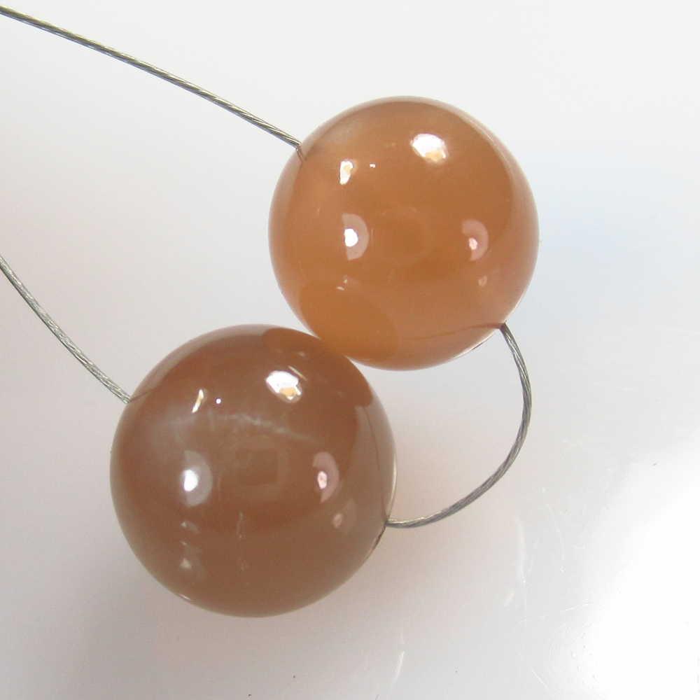 14.88 Ctw Natural 2 Moonstone Drilled Ball Beads: No Reserve! Title: 14.88 Ctw Natural 2 Moonstone Drilled Ball Beads Stone Clarity: Semi -Transparent Gemstones: Moonstone Size/Dimensions: 14.88 Carat Weights: 10.50 - 10.70 mm / 2 PC's Additional Inf