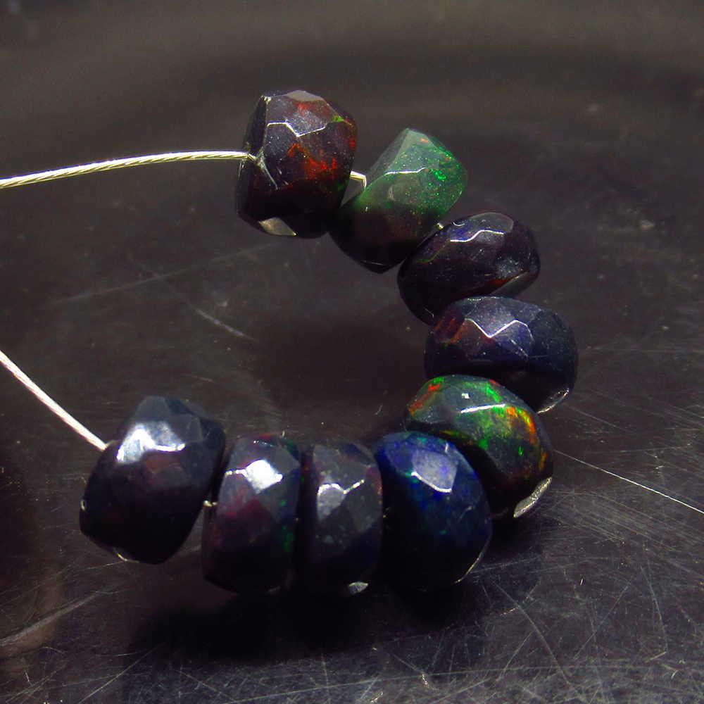 8.55 Ctw Natural 9 Drilled Faceted Black Opal Beads: No Reserve! Title: 8.55 Ctw Natural 9 Drilled Faceted Black Opal Beads Stone Clarity: Translucent Gemstones: Faceted Black Opal Beads Size/Dimensions: 8.55 Carat Weights: 6.60 to 7.00 mm / 9 PC's Addi