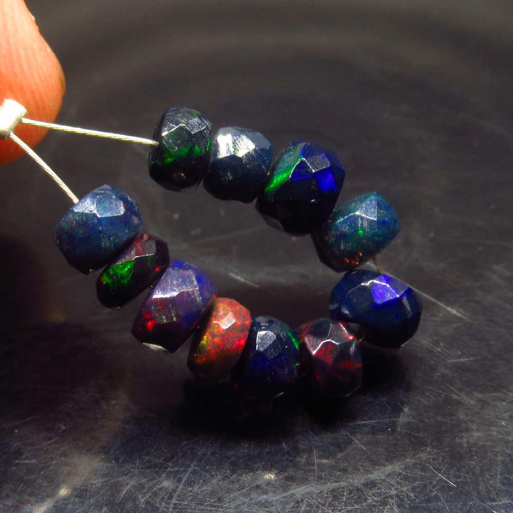 6.81 Ctw Natural 11 Drilled Faceted Black Opal Beads: No Reserve! Title: 6.81 Ctw Natural 11 Drilled Faceted Black Opal Beads Stone Clarity: Translucent Gemstones: Faceted Black Opal Beads Size/Dimensions: 6.81 Carat Weights: 5.20 to 5.70 mm / 11 PC's Ad