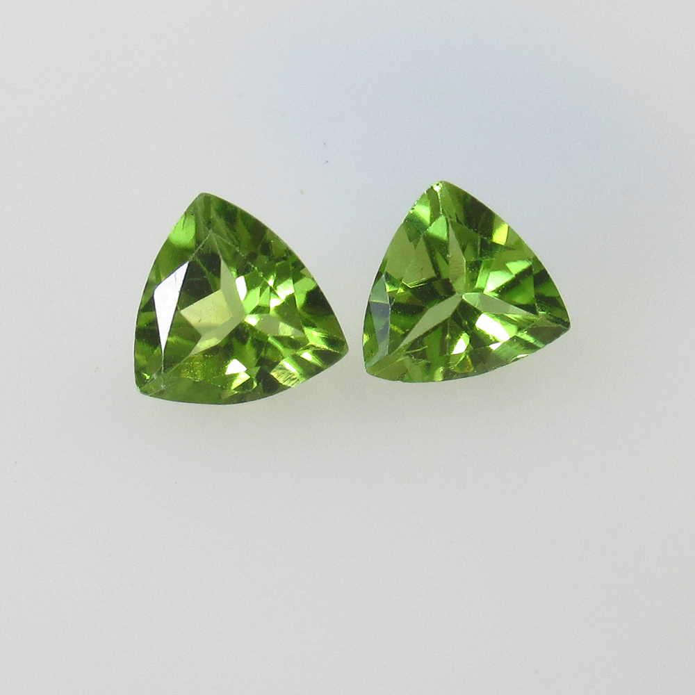 2.22 Ctw Natural Pakistan Peridot Trillion Pair: No Reserve! Title: 2.22 Ctw Natural Pakistan Peridot Trillion Pair Stone Clarity: VVS Gemstones: Peridot Size/Dimensions: 2.22 Carat Weights: 7.00 x 7.00 x 3.90 mm / 2 PC's Additional Information: Top