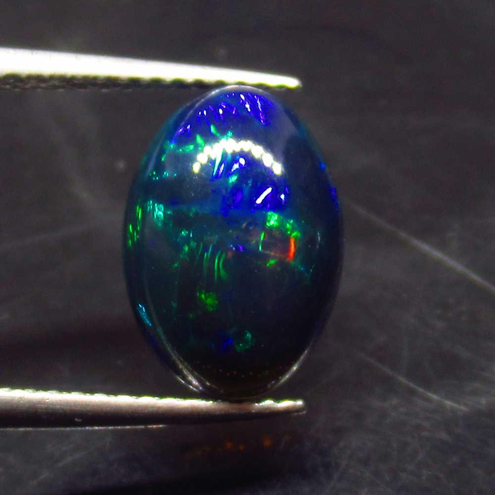 2.02 Ctw Natural Ethiopian Black Fire Opal Oval Cab: No Reserve! Title: 2.02 Ctw Natural Ethiopian Black Fire Opal Oval Cab Stone Clarity: Translucent Gemstones: Black Opal Size/Dimensions: 2.02 Carat Weights: 12.10 x 8.90 x 4.20 mm Additional Informati