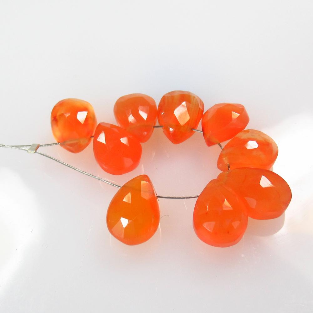24.93 Ct Natural 9 Drilled Carnelian Pear Beads: No Reserve! Title: 24.93 Ct Natural 9 Drilled Carnelian Pear Beads Stone Clarity: Semi-Transparent Gemstones: Natural Carnelian Beads Carat Weights: 24.93 Size/Dimensions: 9.5x7.5 - 12.0x8.7 mm / 9 PC
