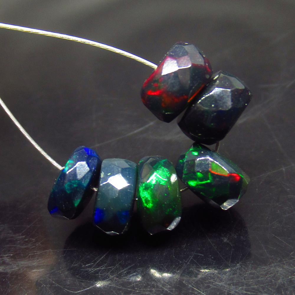 6.24 Ct Natural 6 Drilled Faceted Black Fire Opal Beads: No Reserve! Title: 6.24 Ct Natural 6 Drilled Faceted Black Fire Opal Beads Stone Clarity: Translucent Gemstones: Natural Black Opal Beads Carat Weights: 6.24 Size/Dimensions: 6.80 to 7.30 mm / 6 PC's 