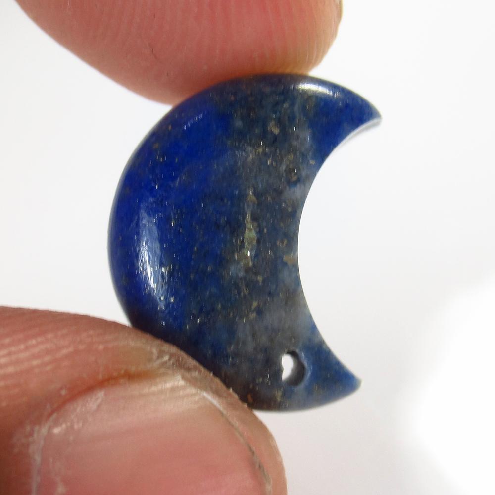 8.76 Ct Natural Drilled Lapis Half Moon Cab: No Reserve! Title: 8.76 Ct Natural Drilled Lapis Half Moon Cab Stone Clarity: Opaque Gemstones: Natural Lapis Lazuli Carat Weights: 8.76 Size/Dimensions: 16.00 x 8.00 x 8.00 mm Additional Information: