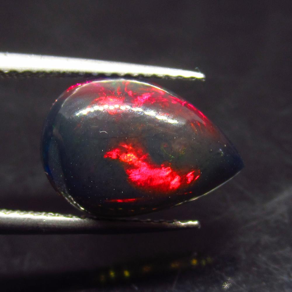2.83 Ct Natural Ethiopian Black Fire Opal Pear Cab: No Reserve! Title: 2.83 Ct Natural Ethiopian Black Fire Opal Pear Cab Stone Clarity: Translucent Gemstones: Natural Black Opal Carat Weights: 2.83 Size/Dimensions: 13.40 x 9.20 x 4.80 mm Additional In