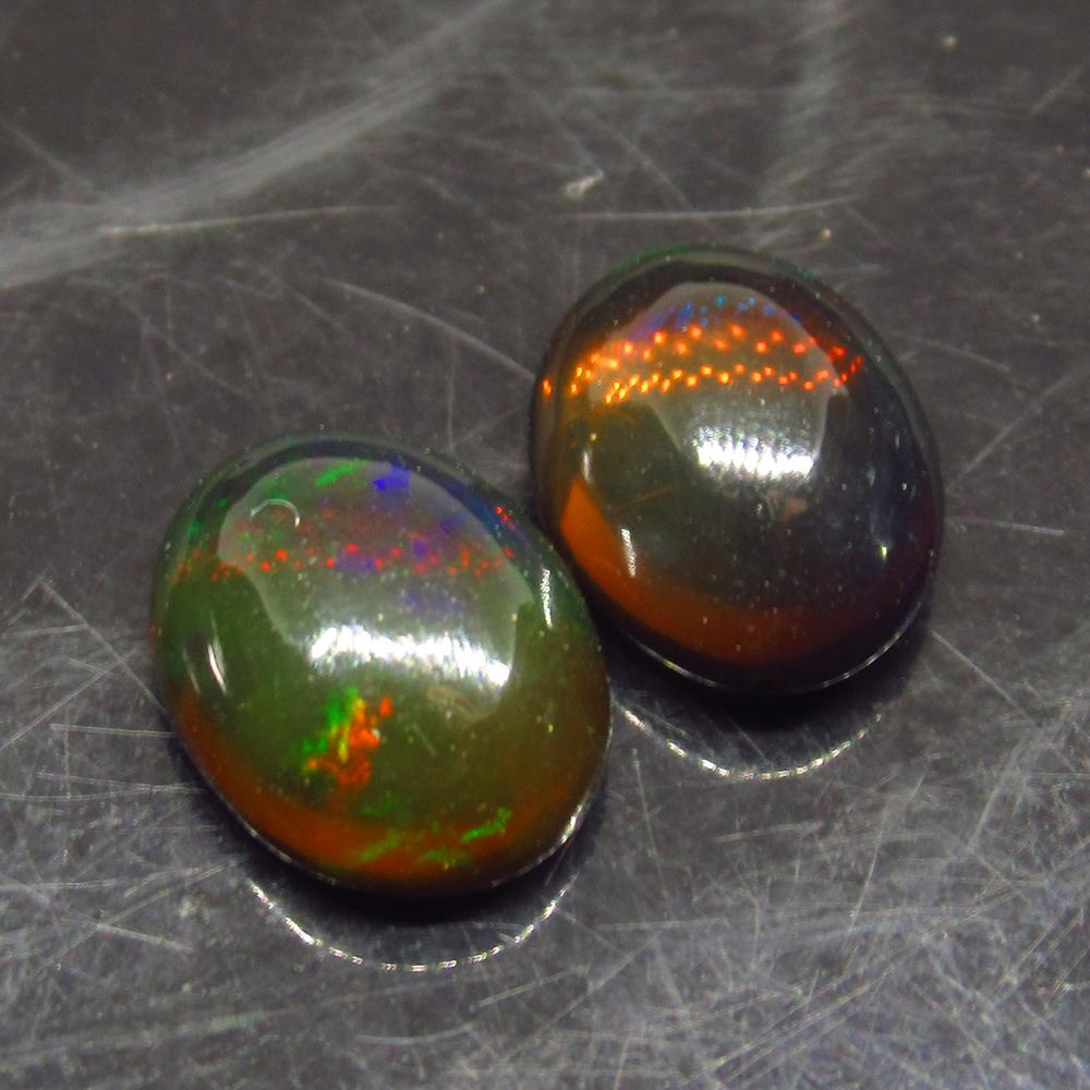 2.30 Ct Natural Ethiopian Black Fire Opal Oval Pair (1 of 2)
