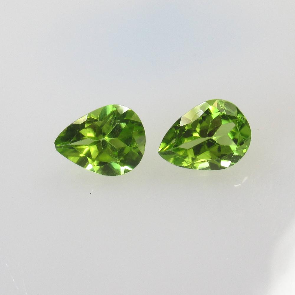 2.19 Ct Natural Pakistan Peridot Pear Pair: No Reserve! Title: 2.19 Ct Natural Pakistan Peridot Pear Pair Stone Clarity: VVS Gemstones: Natural Peridot Carat Weights: 2.19 Size/Dimensions: 8.00 x 5.90 x 4.00 mm / 2 Pc's Additional Information: 