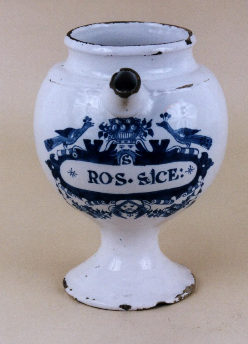 A fine Dutch delft wet drug jar in the peacock pattern: Title: A fine Dutch delft wet drug jar in the peacock pattern Date: c. 1725 Dimension: 8 5/8" H Provenance/additional info: labeled ROS-SICE for a syrup of dried sundew plant Shipping: Domestic: Shipp