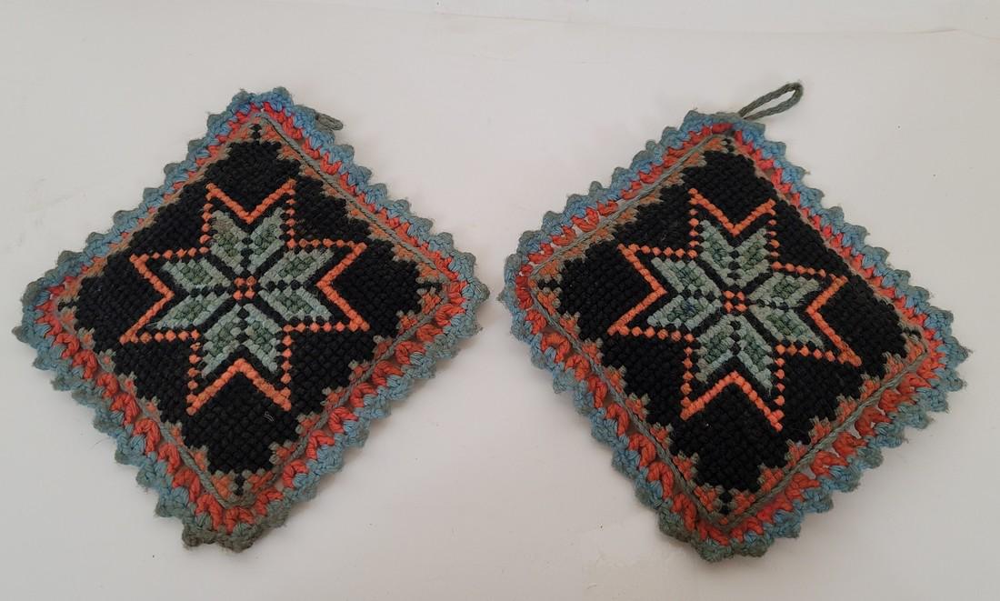 Pair of Amish pincushions ca 1920's: Title: Pair of Amish pincushions ca 1920's Provenance/Additional Info: Crewel type star pincushions with crocheted border in powder blue. Yarn hangers. Excellent condition. Dimension: Each 7" x 7" Shi