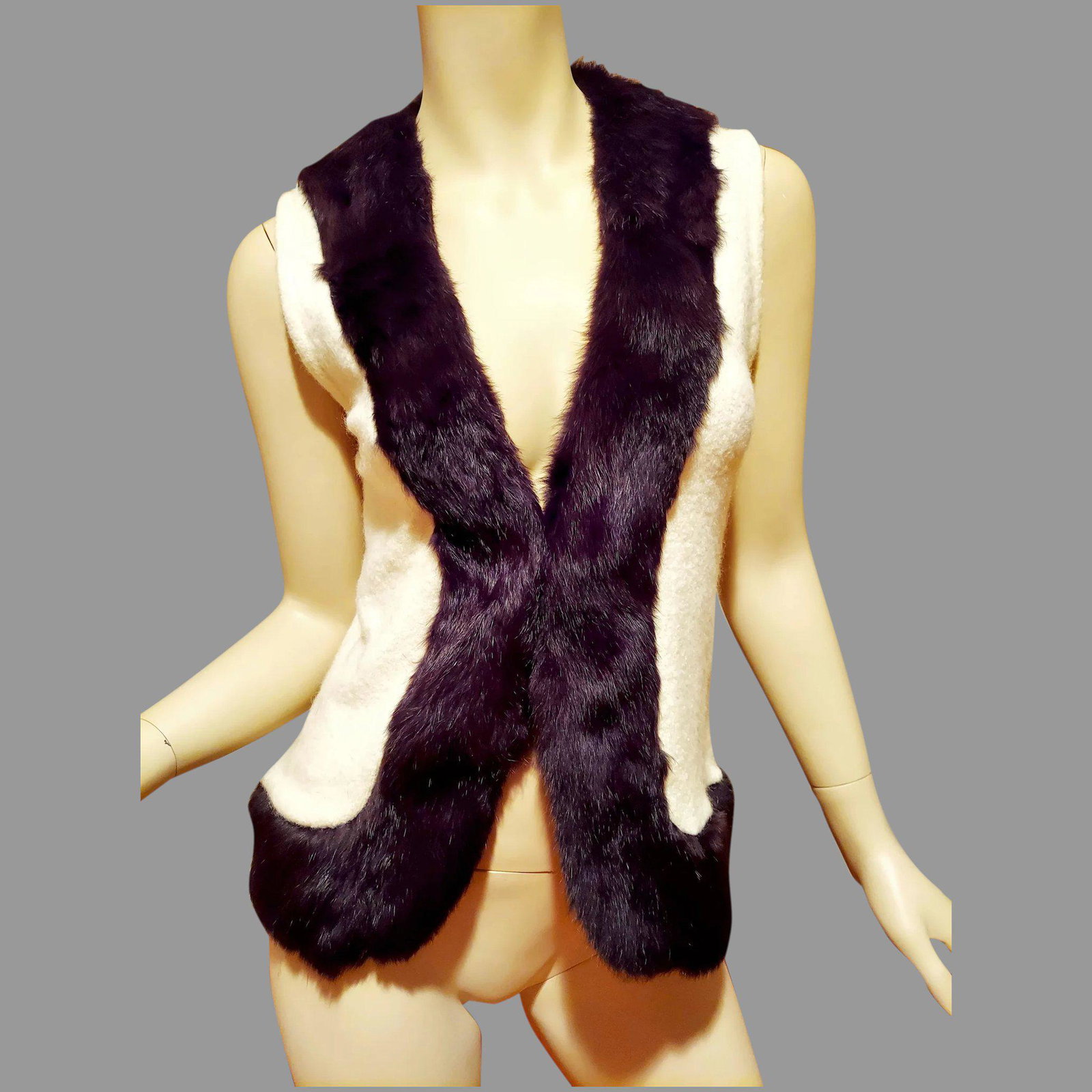 Vtg Silk wool jacket/Vest with fur Collar: This is a Beautiful Vest /Sleeveless jacket with fur full collar it is 85% silk thread is worn open or closed Has a front Hook and eye Reserve: $50.00 Shipping: Domestic: Flat-rate of $30.00 to anywhe