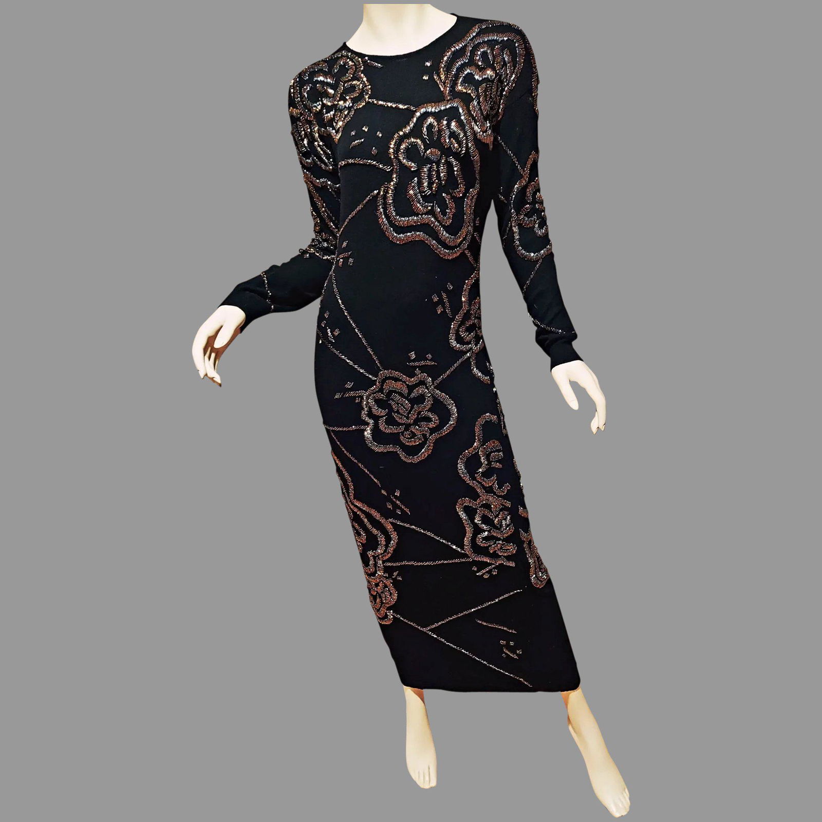 Vtg Cashmere/wool knitted Column maxi dress Copper/Gun: This is a Beauty Combo Cashmere/Wool very fine with hand beaded bugle beads in Copper and Gun Metal colors in a floral design. It is Exquisite in sensual style and workmanship A size M/L It will stret