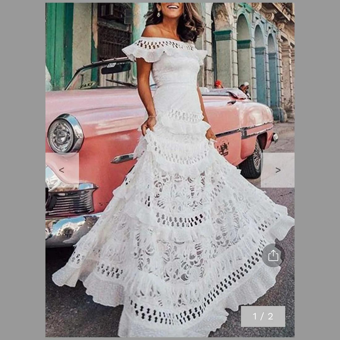 Off the shoulder Falbala Spanish Fiesta Hollow lace: Very Beautiful Fiesta Falbala dress A line skirt with stunning details and Hollow lace. Boho Vacation Chic. Never used in great vintage condition Size- M Has a bit of stretch Reserve: $100.00 Shipping