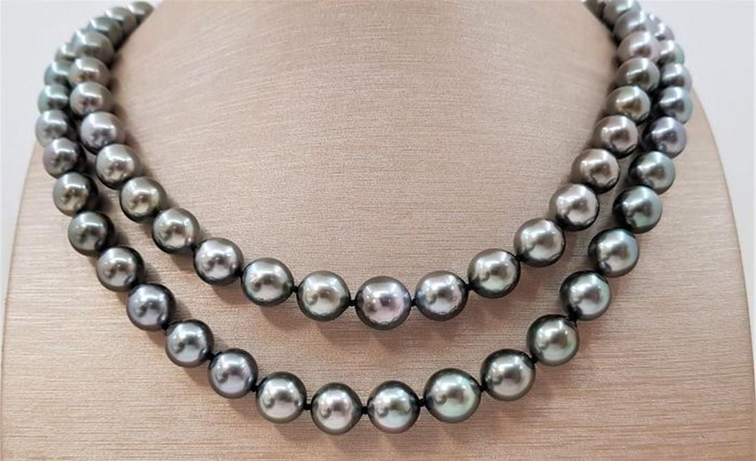 8x11mm Round Peacock Tahitian pearls - Necklace: Title: 8x11mm Round Peacock Tahitian pearls - Necklace escription: A beautiful double pearl necklace of peacock green near round Tahitian pearls with exceptional lustre, finished with an elegant clasp