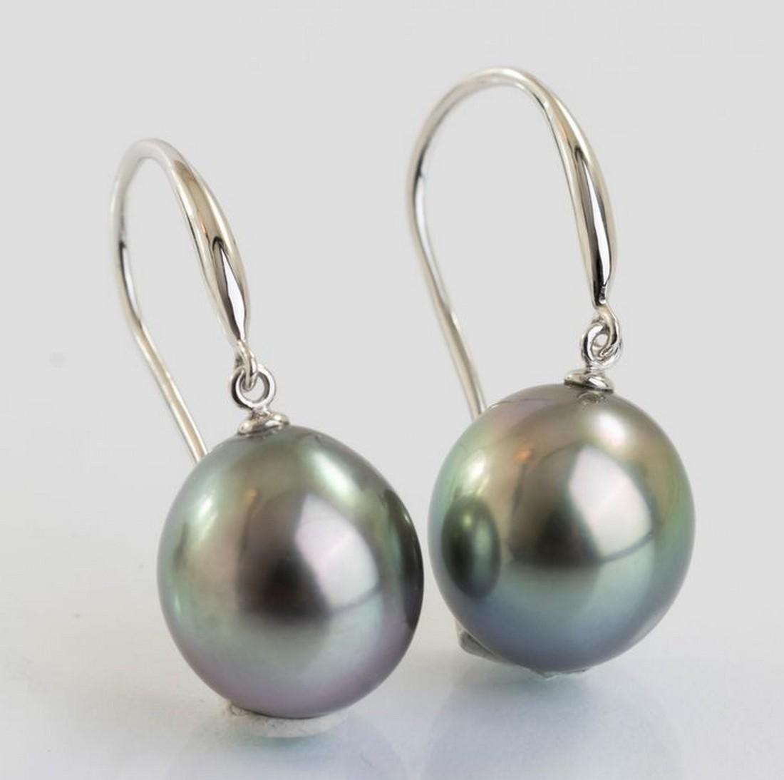 14 kt. White Gold - 10x11mm Peacock Tahitian Pearl: Title: 14 kt. White Gold - 10x11mm Peacock Tahitian Pearl Drops - Earrings escription: Emerging from the tropical lagoons of French Polynesia, these Tahitian pearls have been hand selected for their n