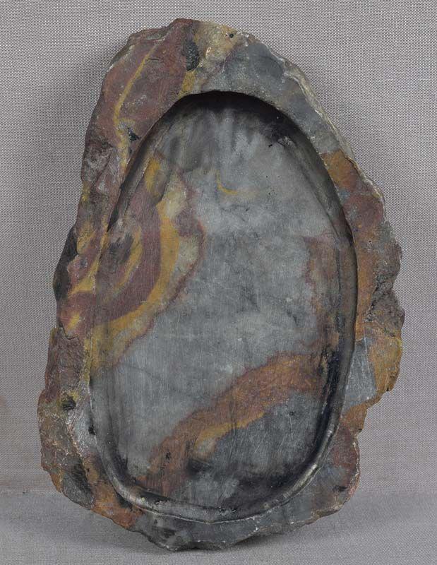 19c Japanese scholar multicolored INKSTONE: 1890s - 1910s (late Meiji - early Taisho) Japanese inkstone with recessed central grinding area and intentionally rough sides and bottom. Used for grinding of an inkstick on the surface of the stone. 
