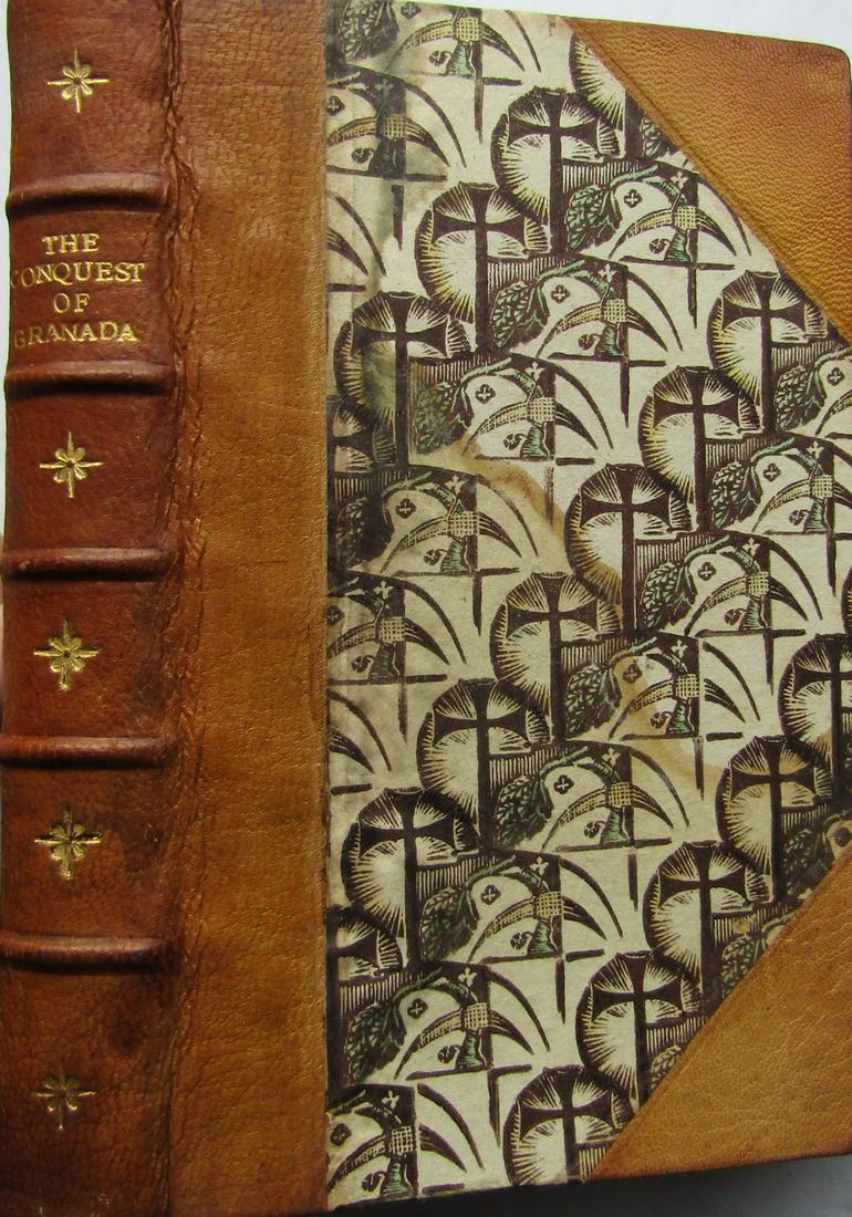 The Conquest of Granada: Everyman's Library. Edited by Ernest Rhys. Half-leather over decorative boards. Colour endpapers. Gilttop page-block. Bookplate inside. Title vignette. Slight watermark to corners of first few pages. 