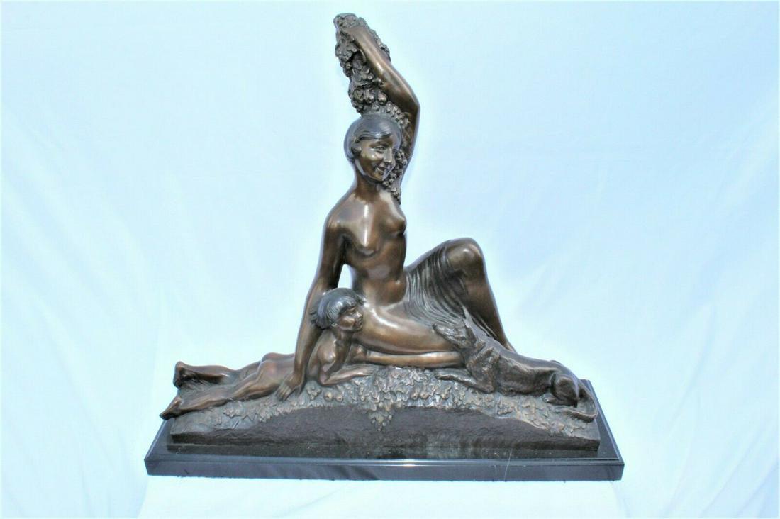 Art Deco Sculpture , Girl w/Child and a Dog , Large: Large bronze with multi-patinas of a seated young girl and a young boy with his dog . Artist signed on the reverse in the style of ( Delandre ) . Made from the original in size and colors . Mounted on