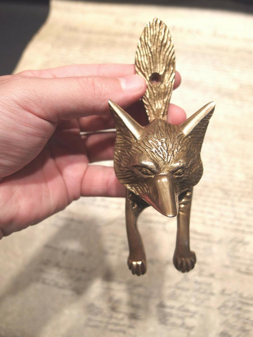 Solid Brass Fox Head Door Knocker Hardware: 6" Height x 2 1/4" Wide x 2" ExtensionGreat reproduction fox head door knocker cast from an antique. Really great authentic looking detail and slight antique patina. This piece is in natural brass so 