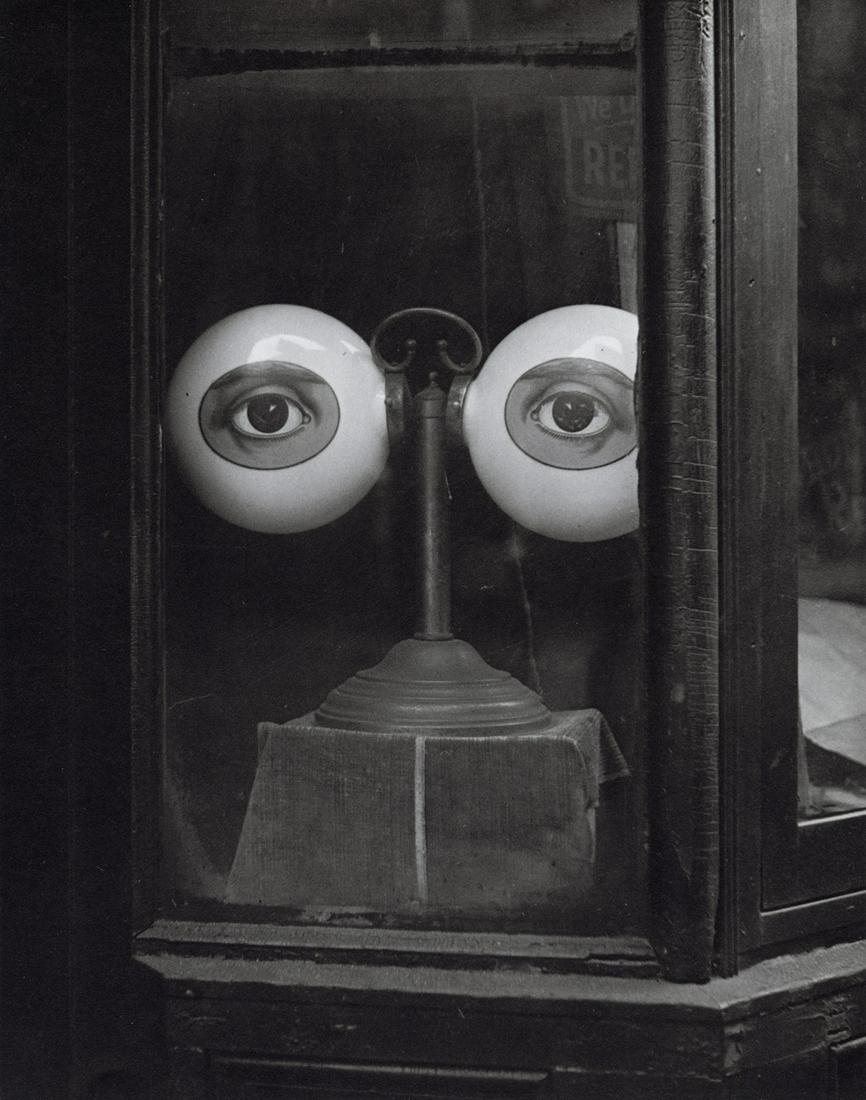 IRVING PENN - Optician's Window, New York, 1939: Artist: Irving Penn Title: Optician's Window, New York, 1939 Medium: Photo Litho, 1986, USA Dimensions: 7x8.9" Description: Heat Wax Mounted on 8.5x11" Conservation Board Artist Bio: Irving Penn (1917