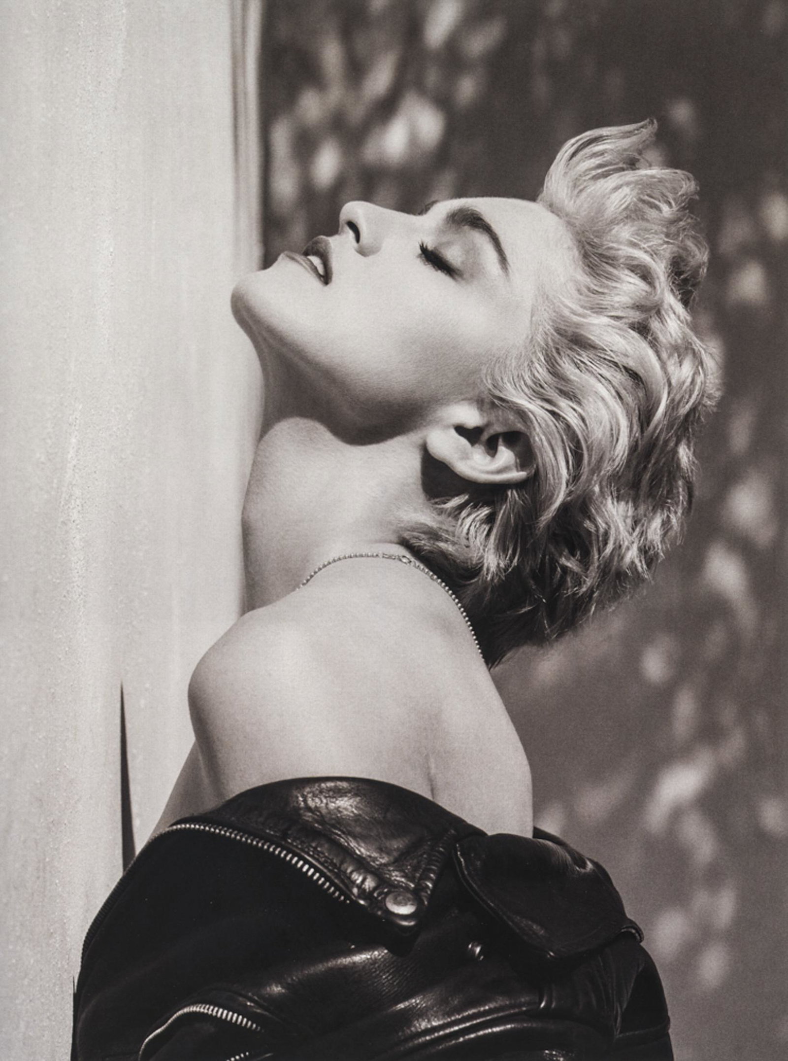 HERB RITTS - Madonna, Hollywood, 1986: Artist: Herb Ritts Title: Madonna, Hollywood, 1986 Medium: Photo Litho, 2002, Italy Dimensions: 7.85x10.5" Description: Heat Wax Mounted on 12x16" Conservation Board Artsit Bio: Herb Ritts (1952-2002)