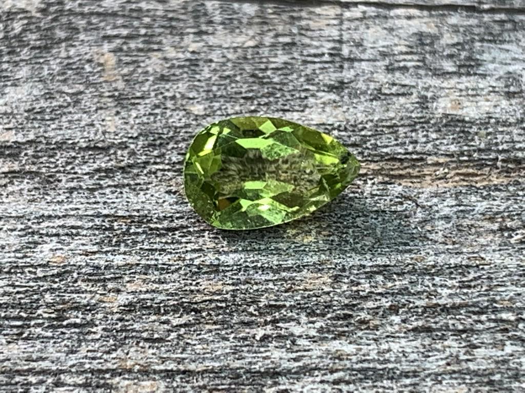 Peridot Pear Shaped .87 Carat Loose Gemstone: No Reserve! Peridot Pear Shaped .87 Carat Loose Gemstone Shipping: Domestic: Flat-rate of $$$ to anywhere within the contiguous U.S. International: Foreign shipping rates are determined by destination