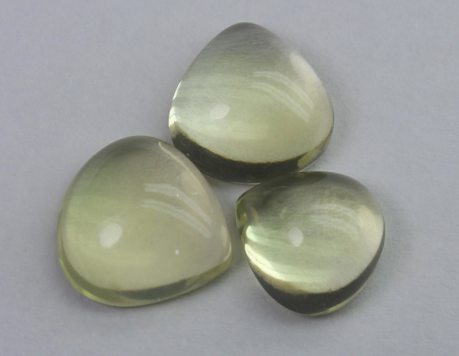 12.38 Ct Natural Lemon Quartz Lot: No Reserve! Title: 12.38 Ct Natural Lemon Quartz Lot Description: Gemstone : Natural Lemon QuartzWeight : 12.38 CaratsDimensions : 11.8x11.8x5 mm , 11.4x10.9x5.3 mm ,10x10x5.3 mmShape : Pear CabochonN