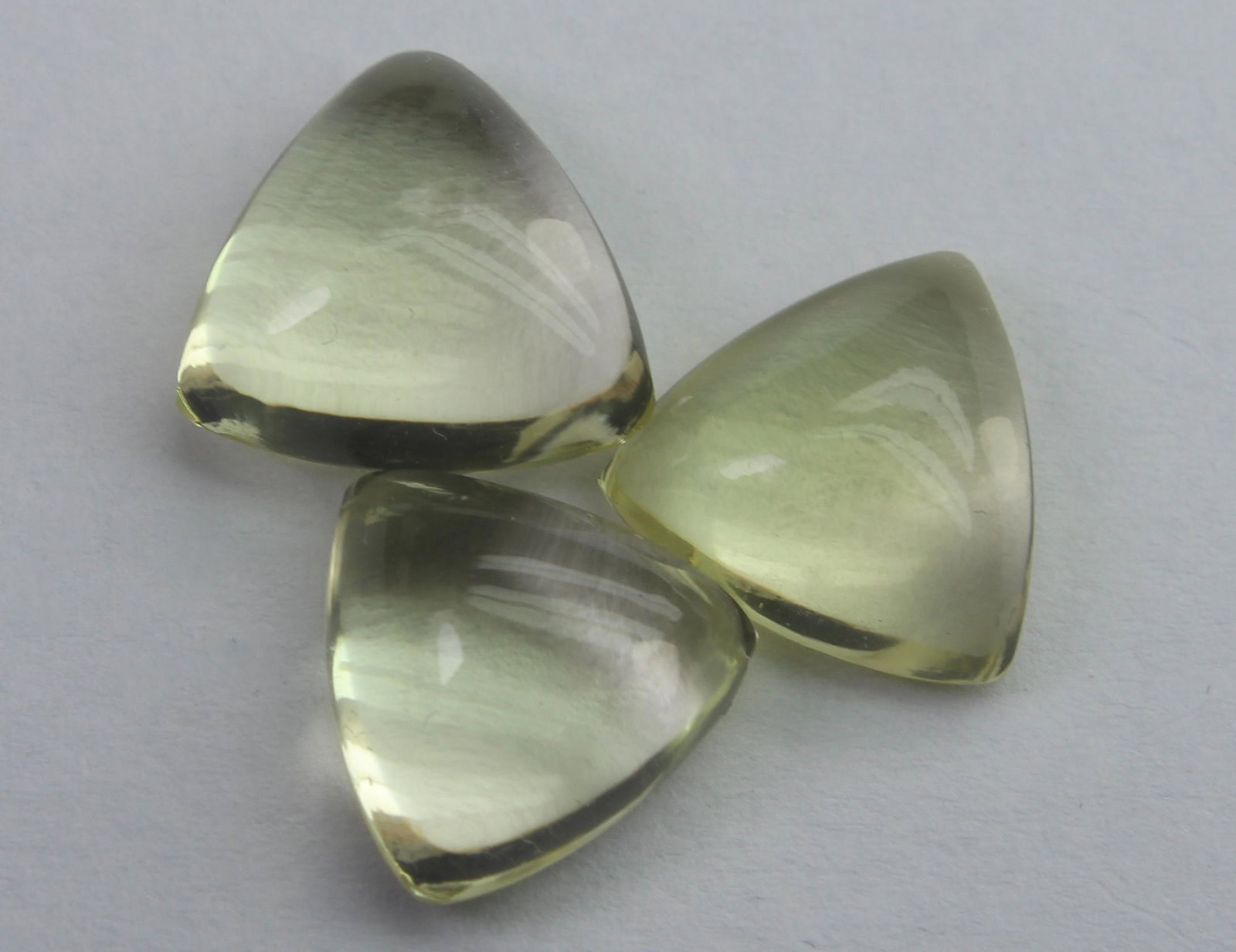 12.45 Ct Natural Lemon Quartz Lot: No Reserve! Title: 12.45 Ct Natural Lemon Quartz Lot Description: Gemstone : Natural Lemon QuartzWeight : 12.45 CaratsDimensions : 11.5x11.1x5.9 mm , 11x10.7x4.9 mm , 10.7x10.5x5.7 mmShape : Triangula