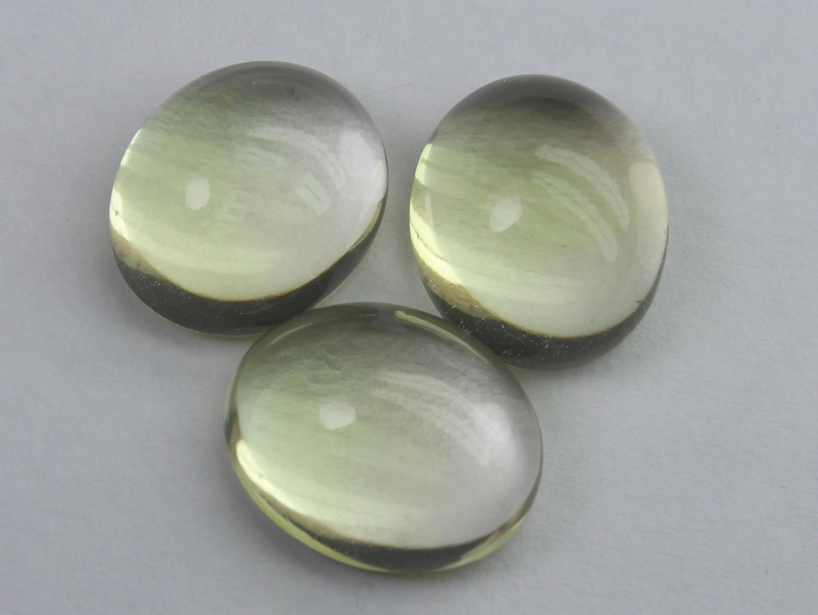 13.08 Ct Natural Lemon Quartz Lot: No Reserve! Title: 13.08 Ct Natural Lemon Quartz Lot Description: Gemstone : Natural Lemon QuartzWeight : 13.08 CaratsDimensions : 11.7x9.7x5.4 mm , 11.2x9.6x5.9 mm , 11.2x9.3x5.7 mmShape : Oval Caboc