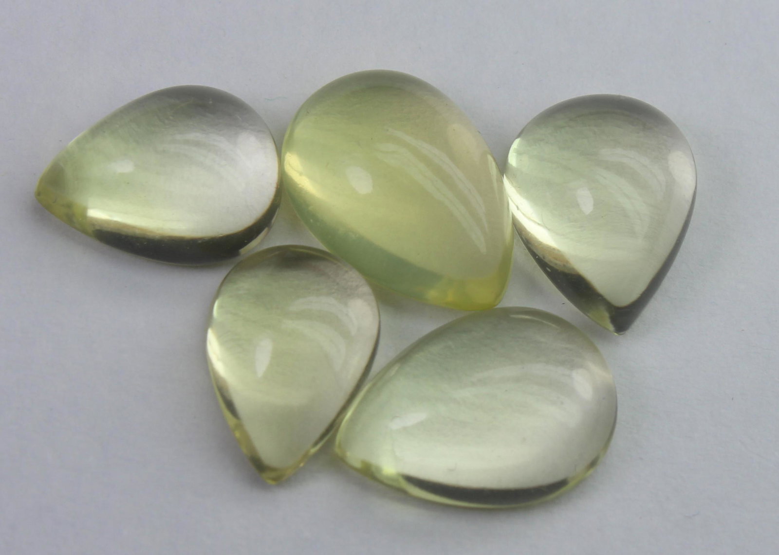 16.23 Ct Natural Lemon Quartz Lot: No Reserve! Title: 16.23 Ct Natural Lemon Quartz Lot Description: Gemstone : Natural Lemon QuartzWeight : 16.23 CaratsDimensions : 12.8x8.9x5.1 mm - 11x7.6x4.2 mmShape : Pear CabochonNumber of Stone :