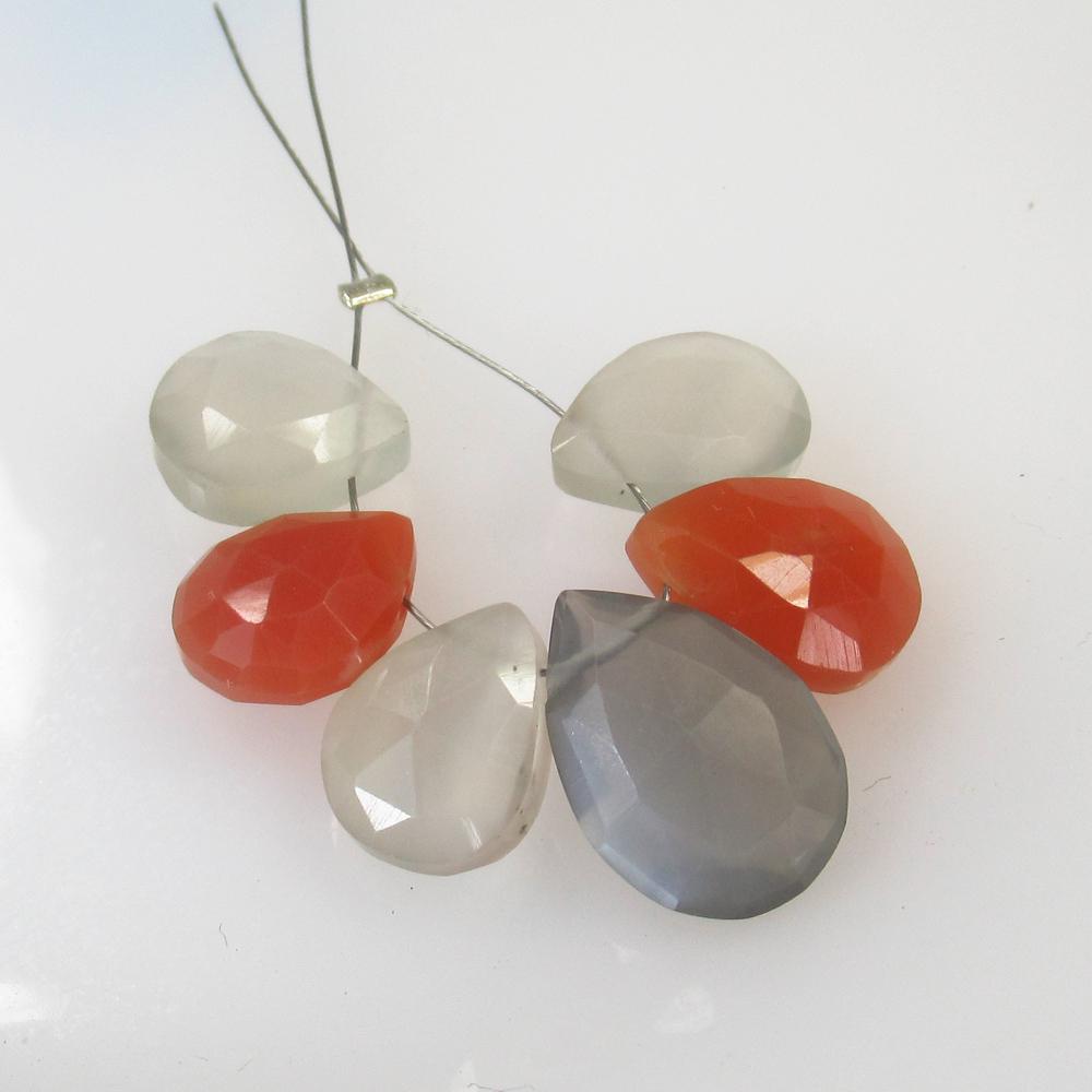 20.67 Ct Natural 6 Drilled Moonstone Pear Beads: No Reserve! Title: 20.67 Ct Natural 6 Drilled Moonstone Pear Beads Stone Clarity: Translucent Gemstone: Natural Moonstone Beads Carat Weight: 20.67 Size/Dimensions: 10.9x8.9 to 14.5x10.3 mm / 6 PC's A
