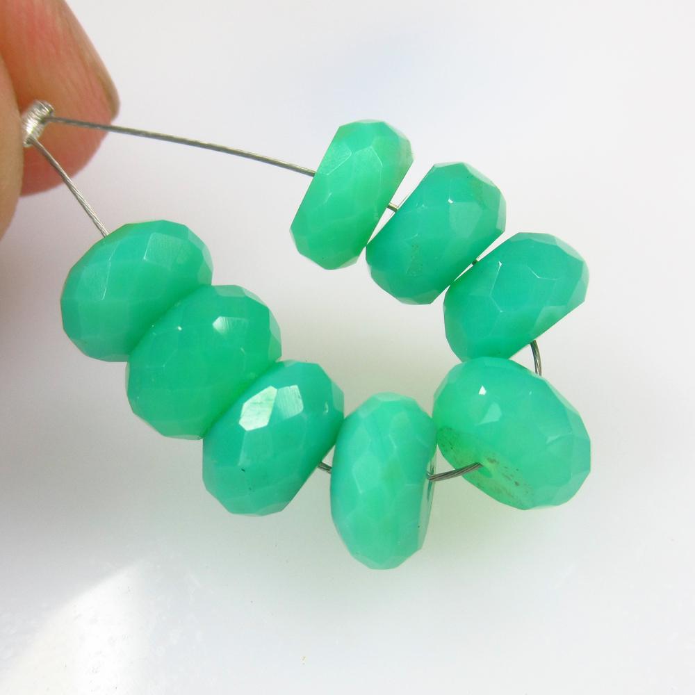 16.53 Ct Natural 8 Drilled Green Chrysophrase Round: No Reserve! Title: 16.53 Ct Natural 8 Drilled Green Chrysophrase Round Beads Stone Clarity: Opaque Gemstone: Natural Chrysophrase Beads Carat Weight: 16.53 Size/Dimensions: 7.60 - 8.00 mm / 8 PC's Add