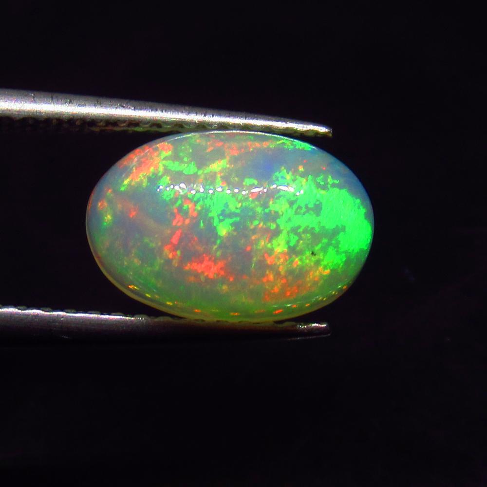1.60 Ct Natural Ethiopian Multicolor Opal Oval Cab (1 of 3)