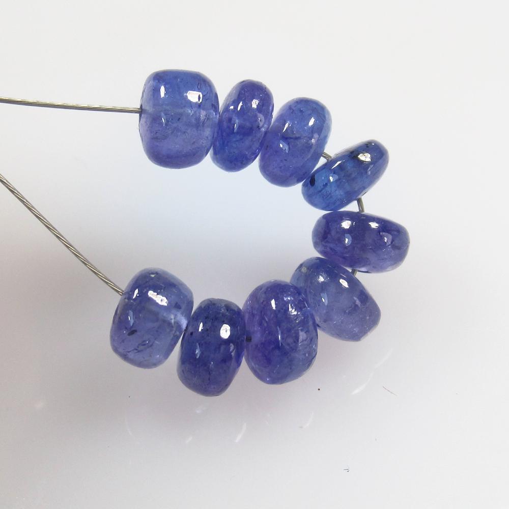 9.01 Ct Natural 9 Drilled Tanzanite Round Beads: No Reserve! Title: 9.01 Ct Natural 9 Drilled Tanzanite Round Beads Stone Clarity: Transparent Gemstone: Natural Tanzanite Beads Carat Weight: 9.01 Size/Dimensions: 5.20 to 5.70 mm / 9 PC's Additional 