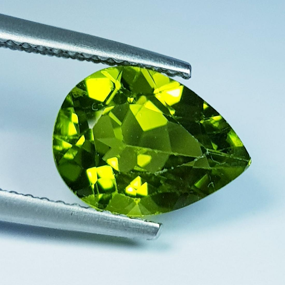 3.34 Ct Natural Peridot Pear Cut: No Reserve! Title: 3.34 Ct Natural Peridot Pear Cut Color/Clarity: IF - VVS Gemstones: Loosegemstone Carat Weights: 3.34 Size/Dimensions: 11.00 x 8.20 x 5.60 Additional Information: Pear / Pakistan Sh