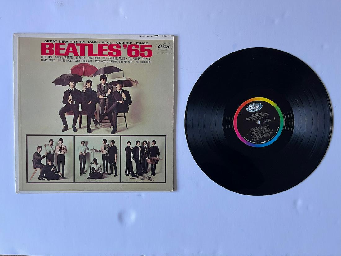 BEATLES '65: BEATLES ’65. CAPITOL. EMI. MONO. T 2228. The Beatles – Beatles '65 Label: Capitol Records – T-2228, Capitol Records – T 2228 Format: Vinyl, LP, Album, Mono, Country: US Released: 15 Dec 1964VI