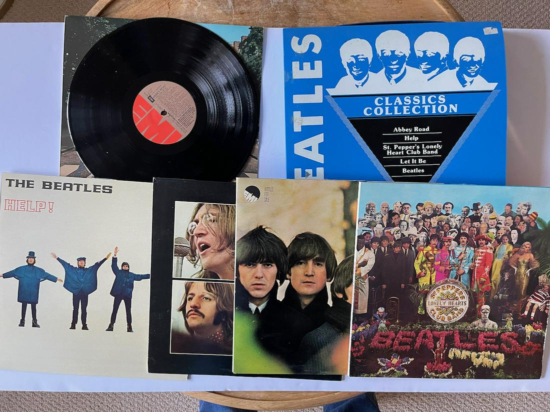 BEATLES CLASSIC COLLECTION WITH DUROFLEX CASE: BEATLES CLASSIC COLLECTION. 5 ALBUMS COME IN DUROFLEX CARRYING CASE. This rare collection box looks like it is from GREECE. IT CONTAINS 5 ALBUMS INCLUDING ABBEY ROAD, HELP, SGT. PEPPERS, LET IT BE AND