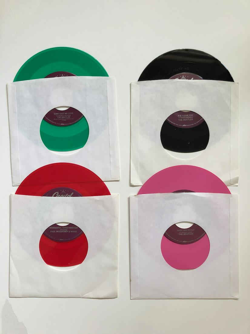 4 BEATLES JUKEBOX VERSION 45s: 4 BEATLES COLORED VINYL. JUKEBOX VERSION 45s. NEVER PLAYED OR LOADED IN JUKEBOX. YOU GET: CAN’T BUY ME LOVE, WONDERFUL CHRISTMASTIME, P.S. I LOVE YOU, TWIST AND SHOUT. THESE VERSIONS ARE SUPER RARE 