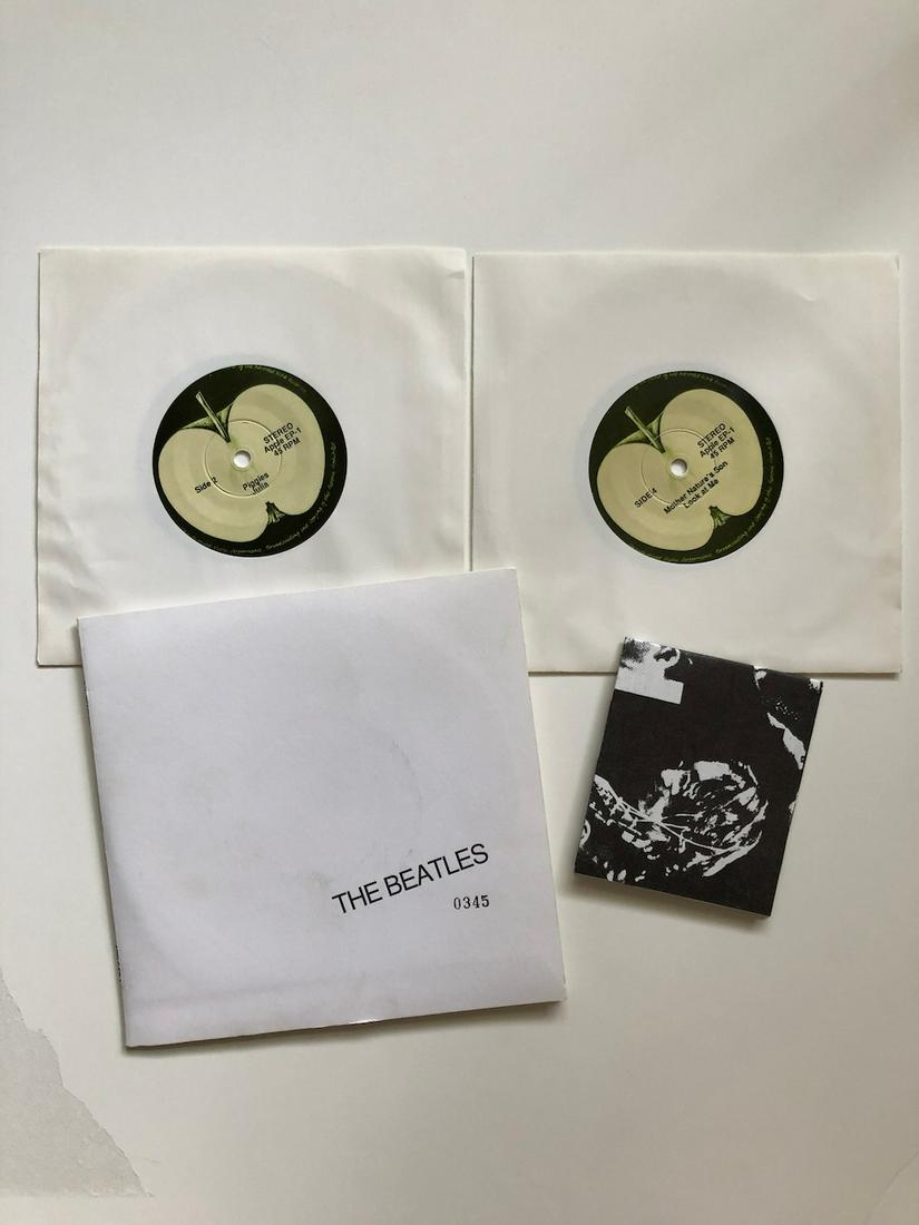 Beatles White EP-1: Beatles White EP-1. BOOTLEG VERSION. HARD TO FIND. RARE. Reserve: $20.00 Shipping: Domestic: Flat-rate of $6.00 to anywhere within the contiguous U.S. International: Foreign shipping rates are determi