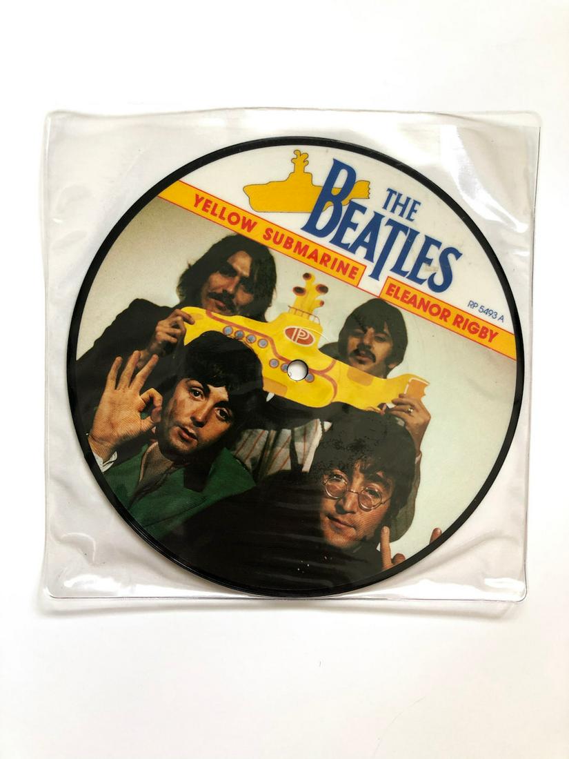Yellow Submarine PICTURE DISC: The Beatles – Yellow Submarine / Eleanor Rigby PICTURE DISC Reserve: $15.00 Shipping: Domestic: Flat-rate of $6.00 to anywhere within the contiguous U.S. International: Foreign shipping rates are de