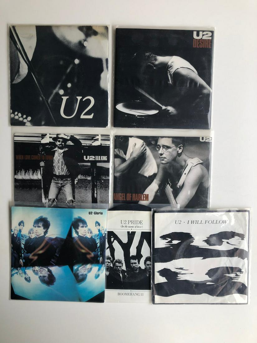 7 U2 45s - RARE I WILL FOLLOW: WITH RARE I WILL FOLLOW !!!! INCLUDES: U2 With B.B. King – When Love Comes To Town Label: Island Records – 7-99225 Format: Vinyl, 7", 45 RPM, Single, Stereo, Specialty pressing Country: US Release