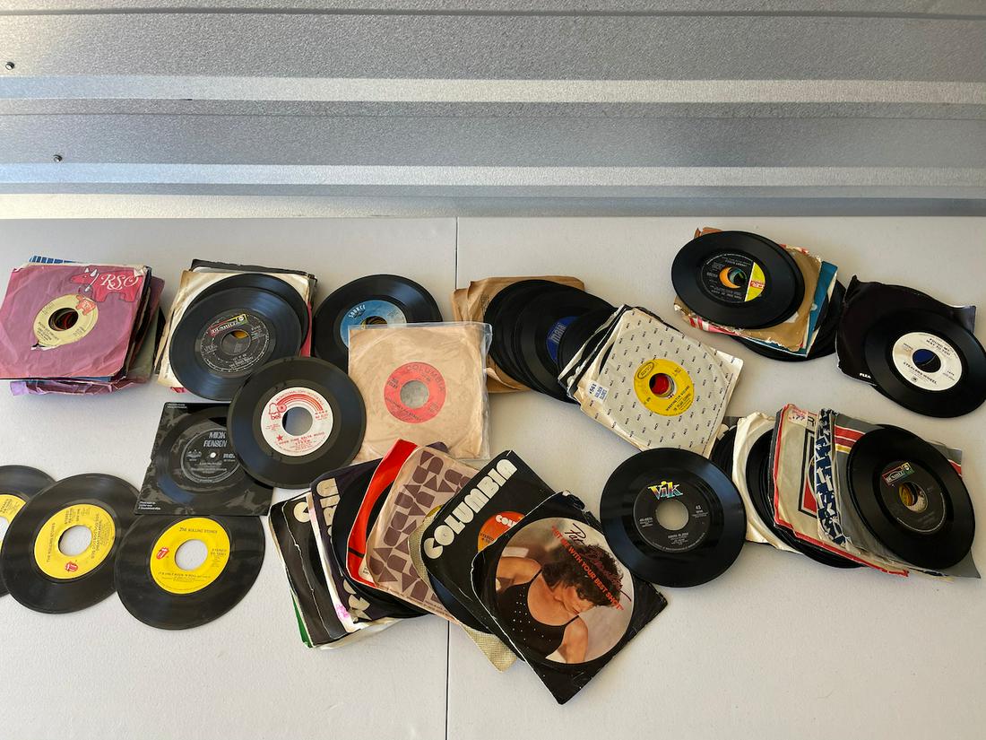 A COLLECTION OF USED 45s: A COLLECTION OF USED 45s including: GOOD TIME DELTA MUSIC BY STORM - DJ PROMO COPY. POSITIVELY 4TH STREET BY BOB DYLAN. LOVE ME TENDER EVATONE FLEXI -DISC. ROLLING STONES 45s. Various used condition. 